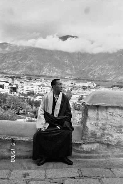 B&W-Monk overlooking rear of Potala.jpg